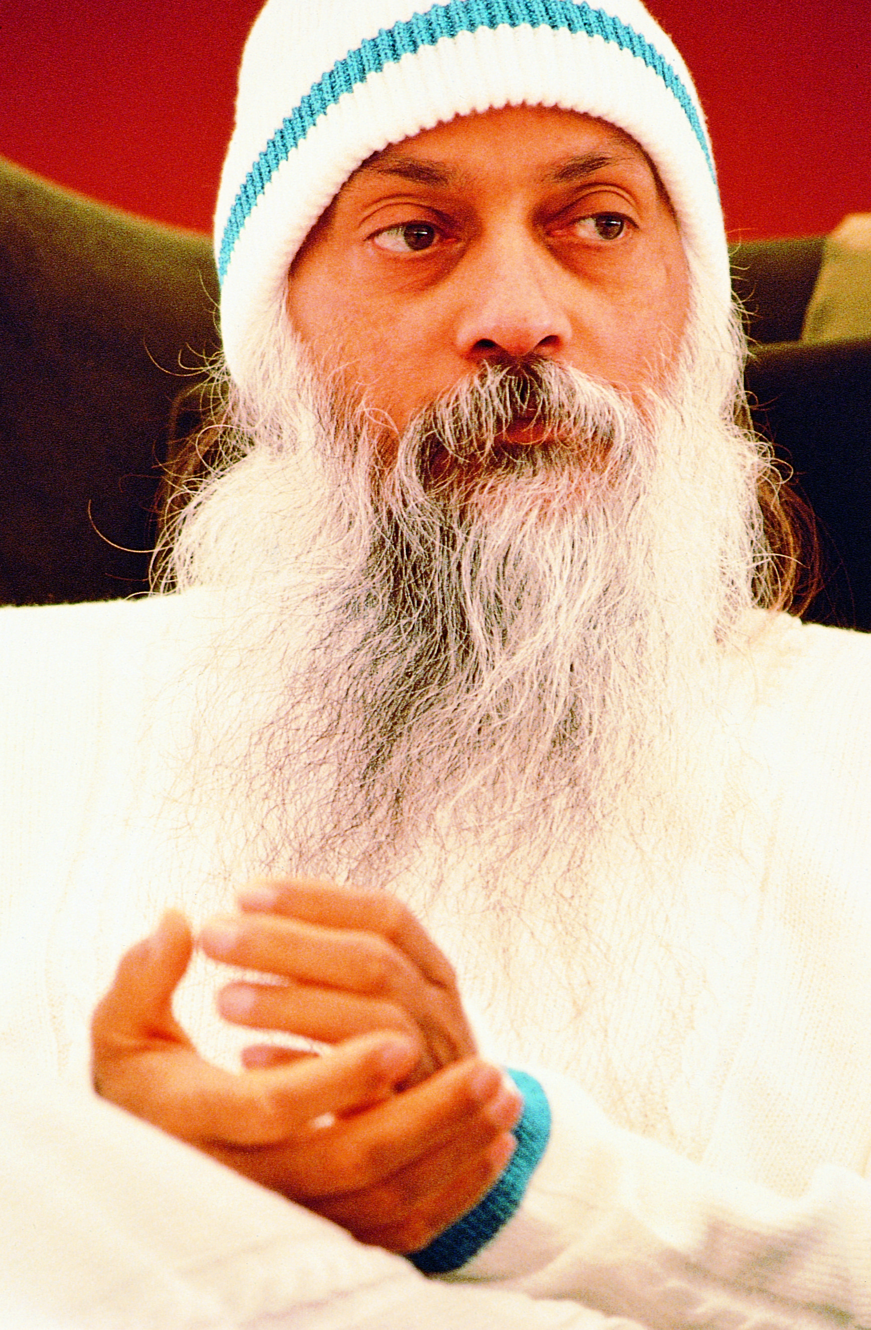 Osho wearing the robe and cap, 1982